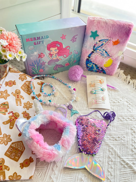 The full mermaid gift set laid out with its boutique gift box